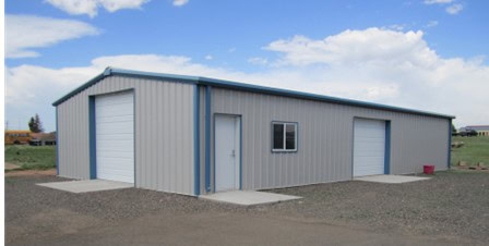 Metal storage building with two garage doors.